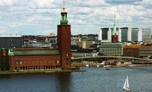 Stockholm City Hall in front of the city centre. Stockholm’s inner city is characterised by a demand for property that far exceeds supply. This has led to further densification approaching the limit of what is viewed as appropriate in the city. 